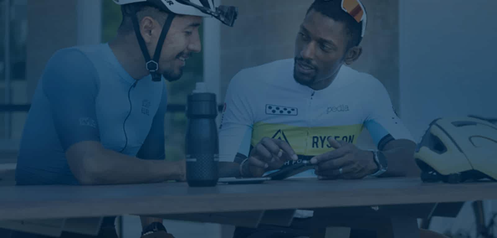 The Best In The Game For Coaches. Coach Showing Male Cyclist How To Train With Trainingpeaks.