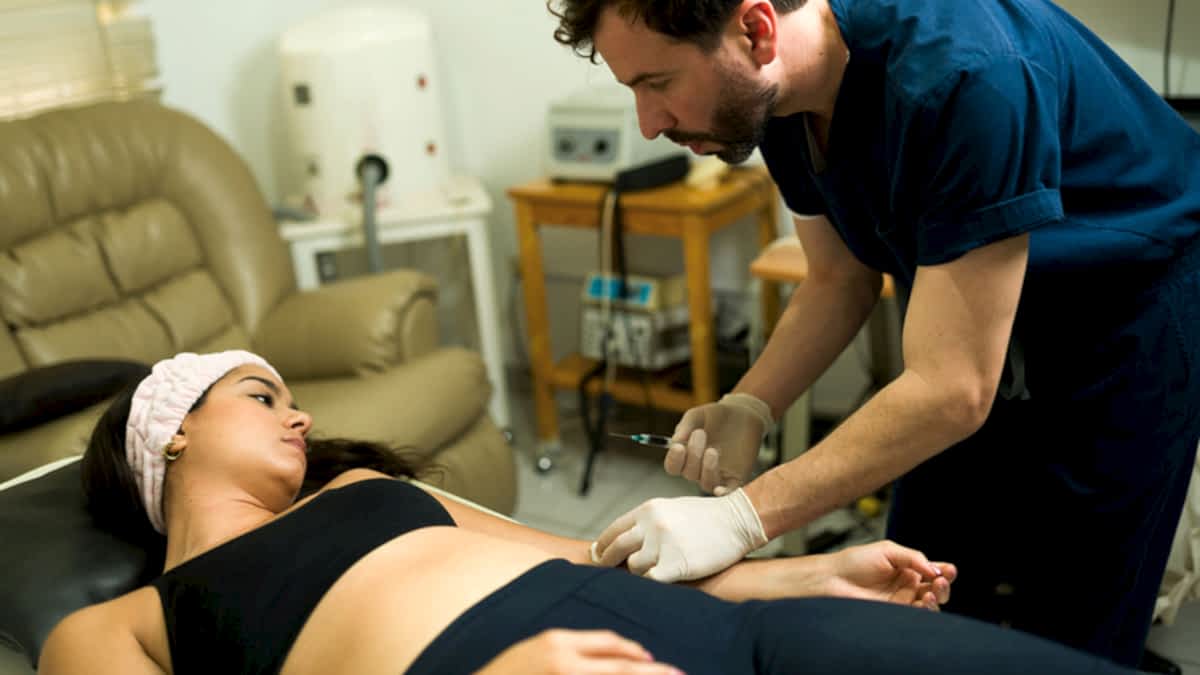 Athlete Patient Receiving Regenerative Prp Treatment From Physical Therapists